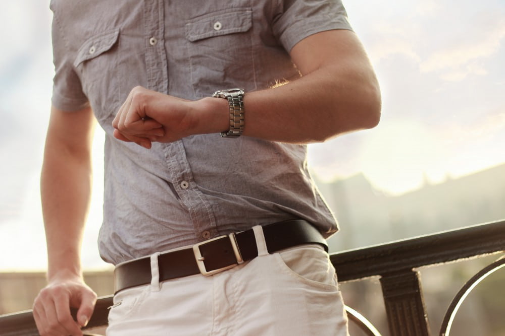 Construction manager checking watch